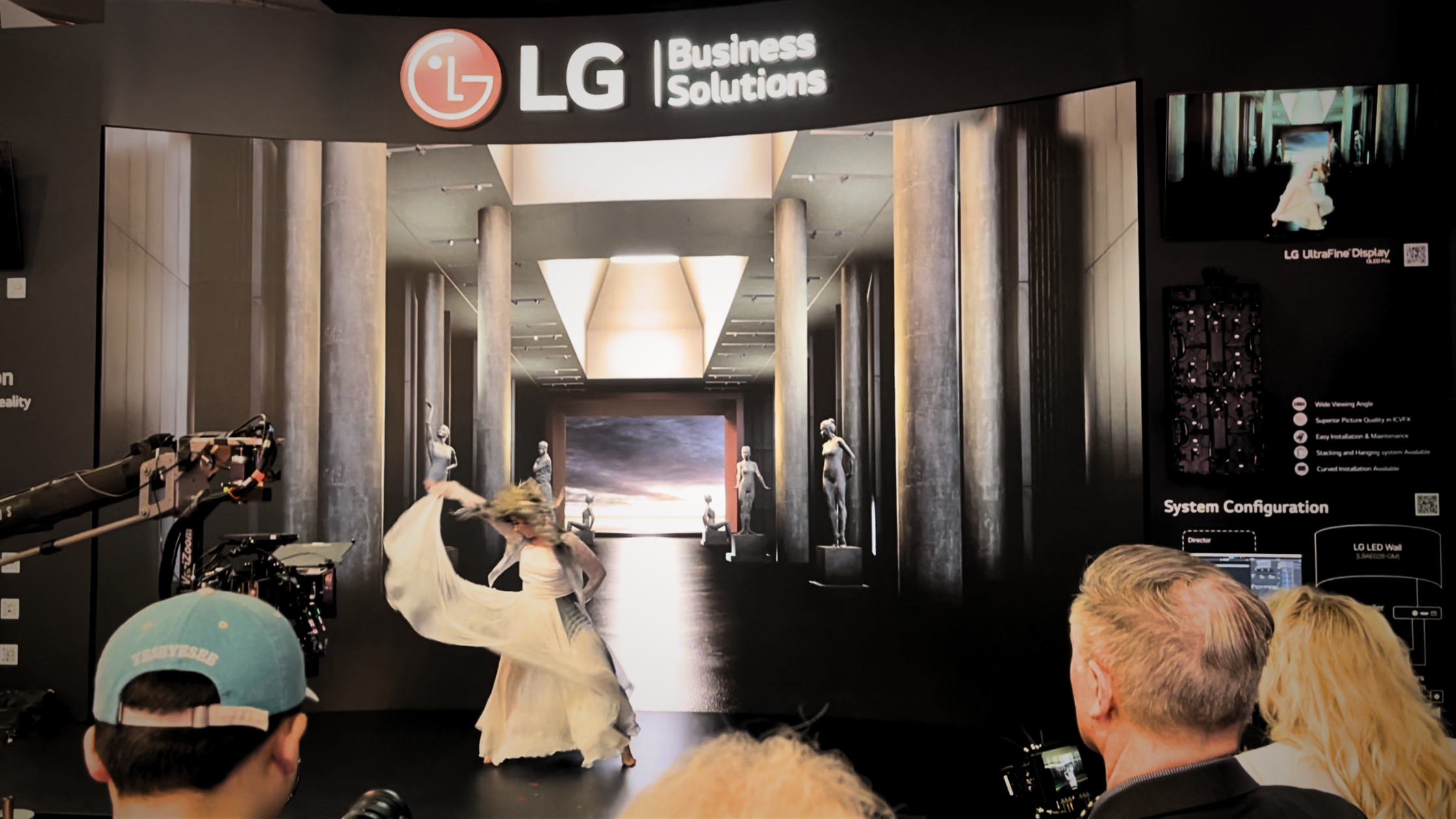 Ballet dancer in front of LG Business Systems screen display